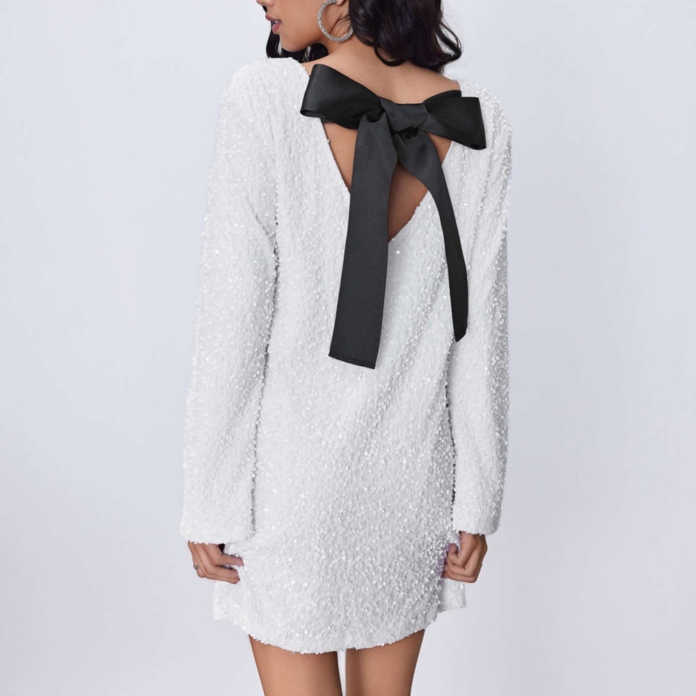 Elegant White Dress with Black Bow
